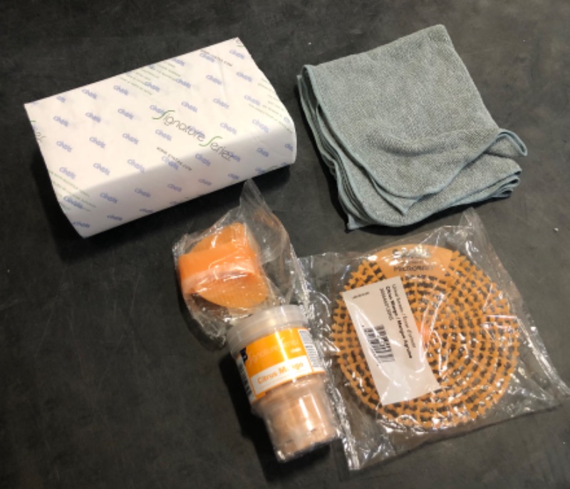 Photo 1 of CINTAS Toliet Cleaning Urinal Screen, Urinal Clip, Mango Citrus Scent with Micro Cloth and Napkins