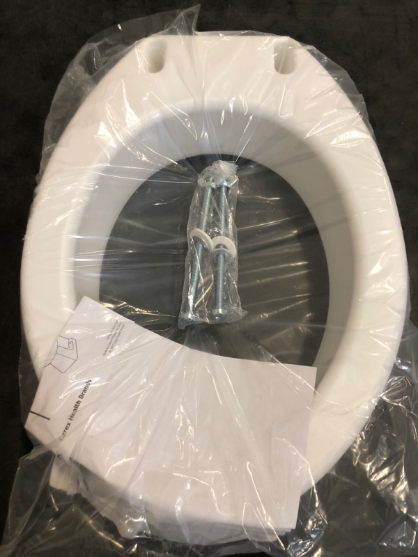 Photo 1 of Carex Toilet Seat Riser, Elongated Raised Toilet Seat Adds 3.5 inches to Toilet Height, for Assistance Bending or Sitting, 300 Pound Weight Capacity Toilet Riser