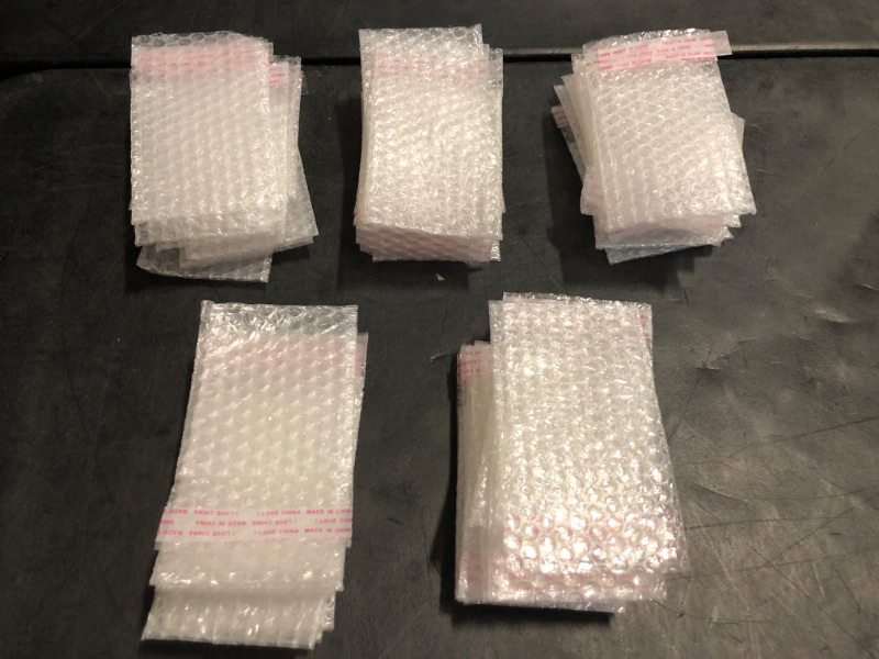 Photo 1 of ROUND RICH 50 Pack Clear Bubble Pouches 6x8 inch with Double Walled Bubble Thickening Shockproof Foam Wrap Bags for Cushioning Packing Shipping Moving and Storage