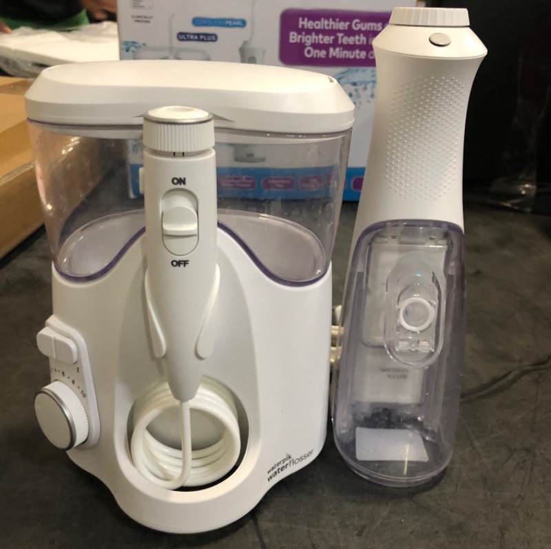 Photo 1 of Waterpik Ultra Plus and Cordless Pearl Water Flosser Combo Pack