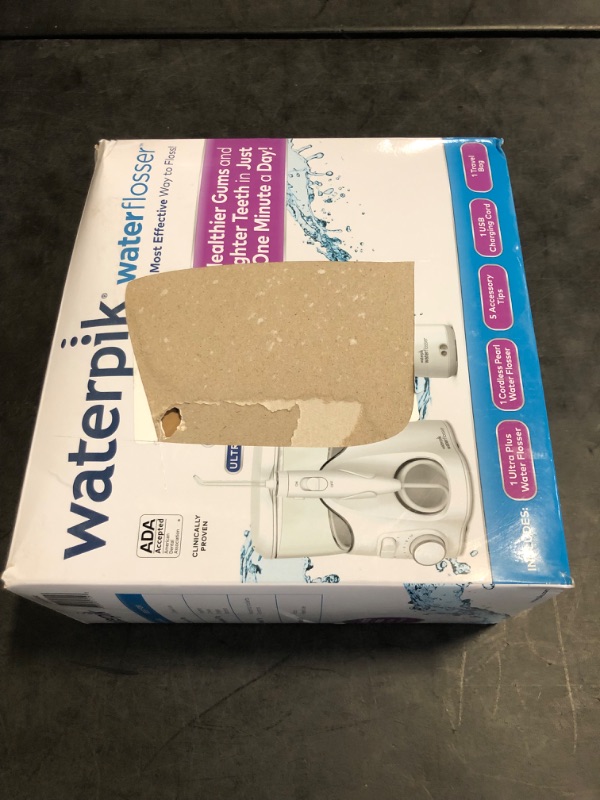 Photo 1 of Waterpik Ultra Plus and Cordless Pearl Water Flosser Combo Pack