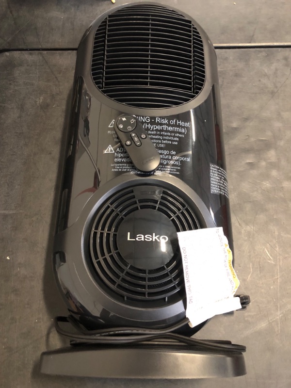 Photo 1 of LASKO 27" Motion X Console Space Heater with Remote Control , BLACK