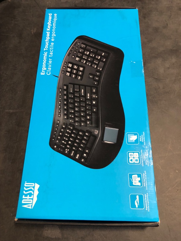 Photo 1 of Adesso AKB-450UB - Ergonomic Keyboard with Built-in Touchpad, Wired, Multimedia Hotkeys, Split Keys Design, Built-in Palm Rest for Comfort - Compatible for PC & Windows XP/7/8/10