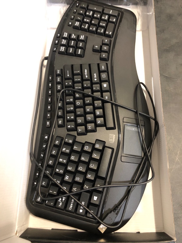 Photo 1 of Adesso AKB-450UB - Ergonomic Keyboard with Built-in Touchpad, Wired, Multimedia Hotkeys, Split Keys Design, Built-in Palm Rest for Comfort - Compatible for PC & Windows XP/7/8/10