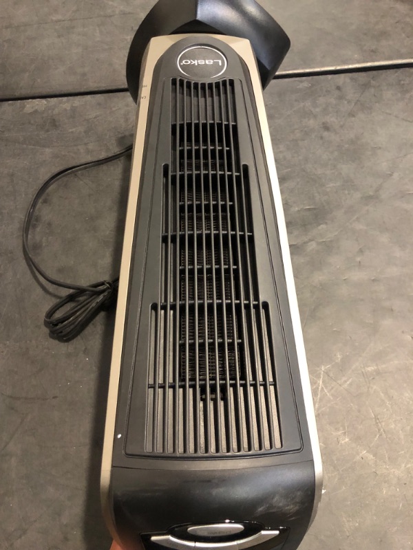 Photo 1 of Missing Remote and has Minor Sticker Damage** Lasko Oscillating Ceramic Tower Space Heater for Home with Adjustable Thermostat, Timer and Remote Control, 22.5 Inches, 1500W, 751320