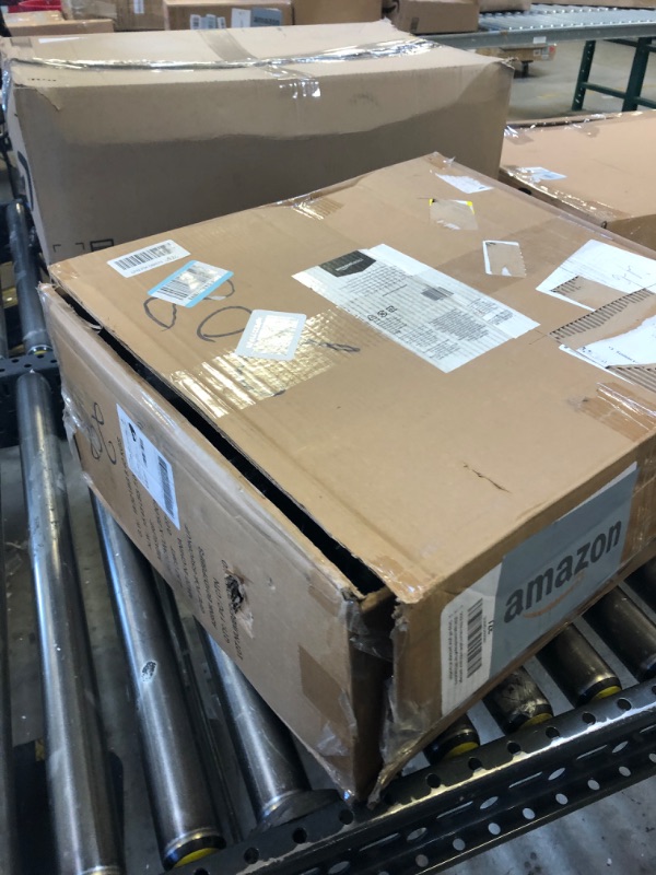 Photo 1 of Amazon Basics Low-Back Computer Task Office Desk Chair with Swivel Casters - Black