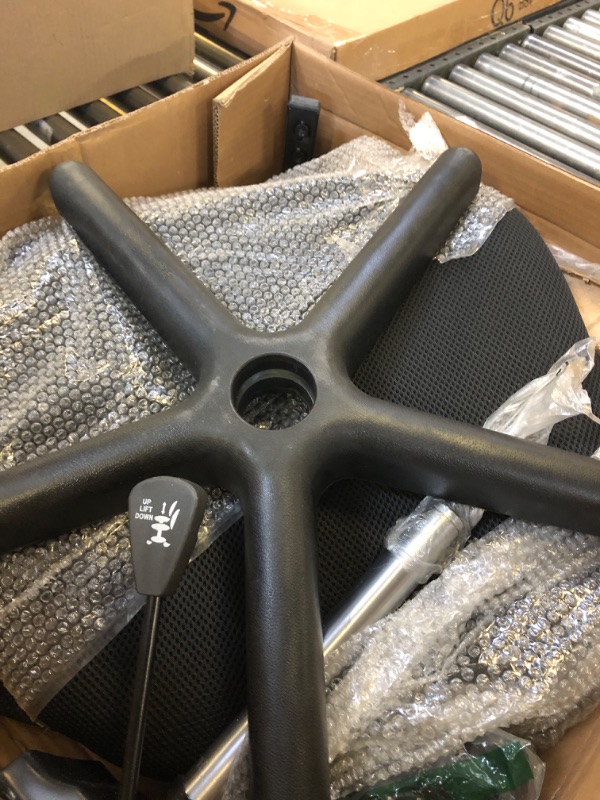 Photo 1 of Amazon Basics Low-Back Computer Task Office Desk Chair with Swivel Casters - Black