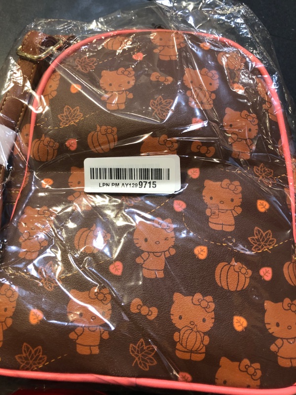 Photo 2 of Loungefly x Sanrio Hello Kitty Pumpkin Spice Allover Print Mini Convertible Backpack