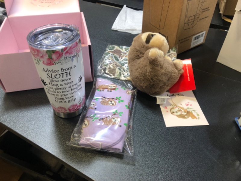 Photo 1 of Sloth Themed Gift set with cup, sloth doll, socks, and small bag