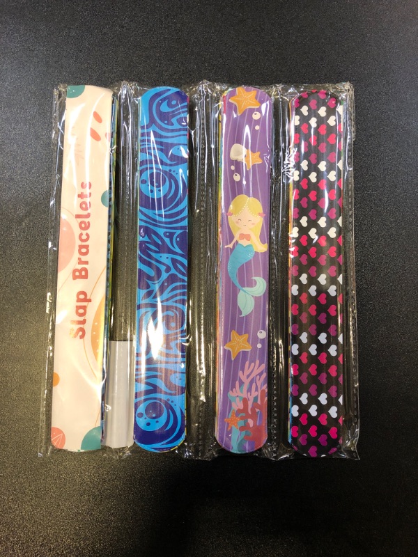 Photo 2 of AMOR PRESENT Slap Bracelets Bulk, 48PCS Snap Bracelets for Kids Tie Dye Wrist Band Mermaid Sports for Party Favors Carnival Prizes Goodie Bags Groove Party