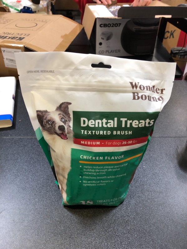 Photo 2 of Amazon Brand - Wonder Bound Dog Dental Treats for Medium Dogs (25-50 lbs), Real Chicken Flavor, Nubbed Texture for Plaque & Tartar Control, Freshens Breath While Chewing, 38 Count BB AUG2024