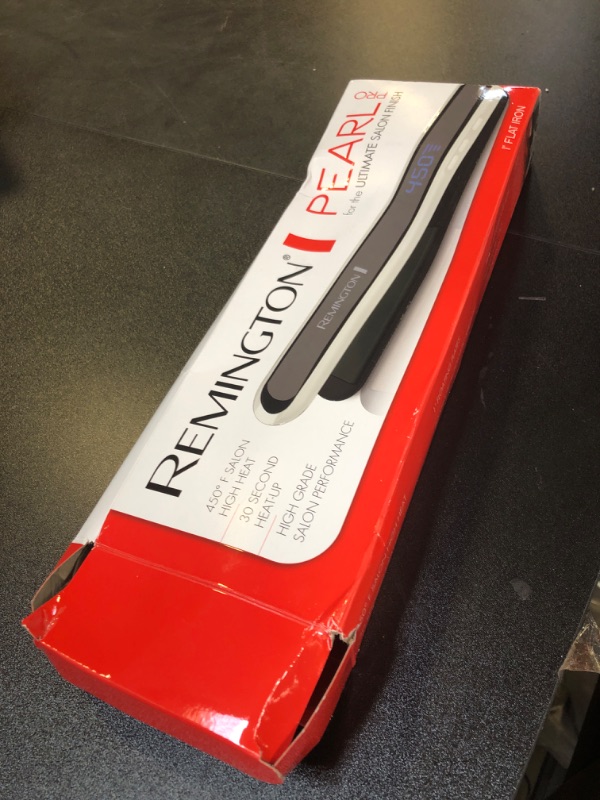 Photo 1 of Remington flat iron 