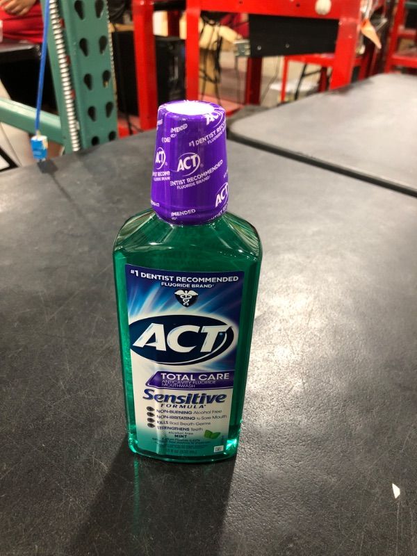 Photo 1 of ACT Total Care Sensitive Formula Mouthwash 18 fl. oz. Anticavity Mouthwash With Fluoride, Mint Sensitive Formula Mint 18 Fl Oz (Pack of 1)