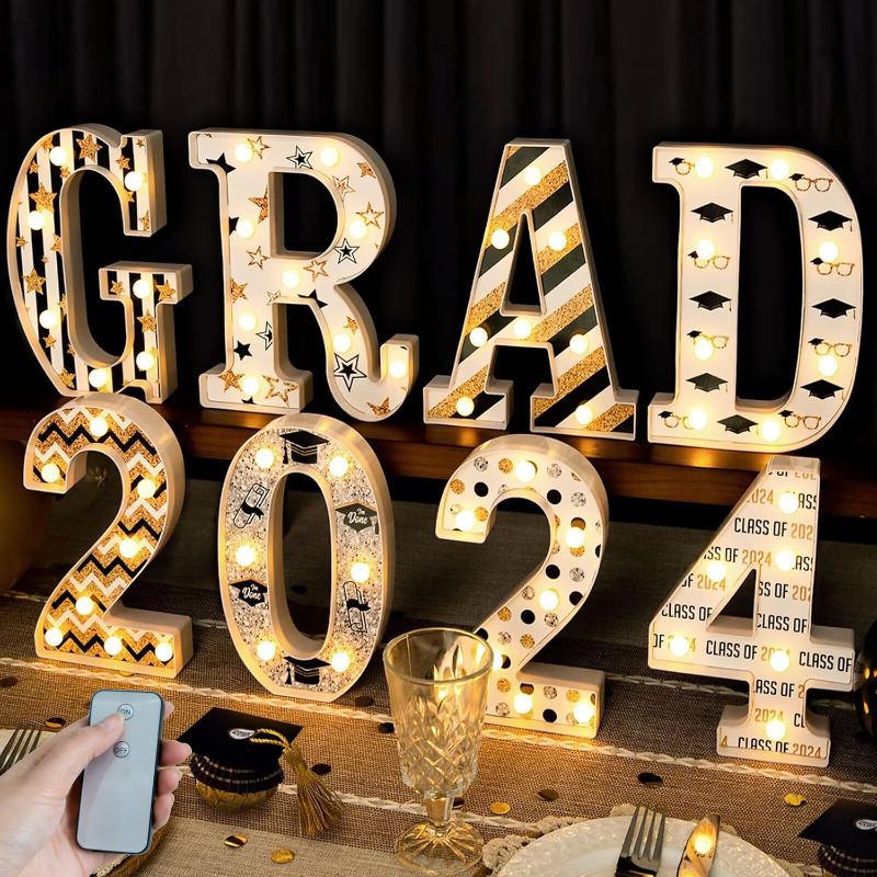 Photo 1 of 2024 Graduation Decorations - 8 LED Marquee Light Up Letters 'GRAD 2024' with Remote - Class of 2024 Graduation Decor Sign for Kindergarten Preschool High School College Wall Table Party Supplies
