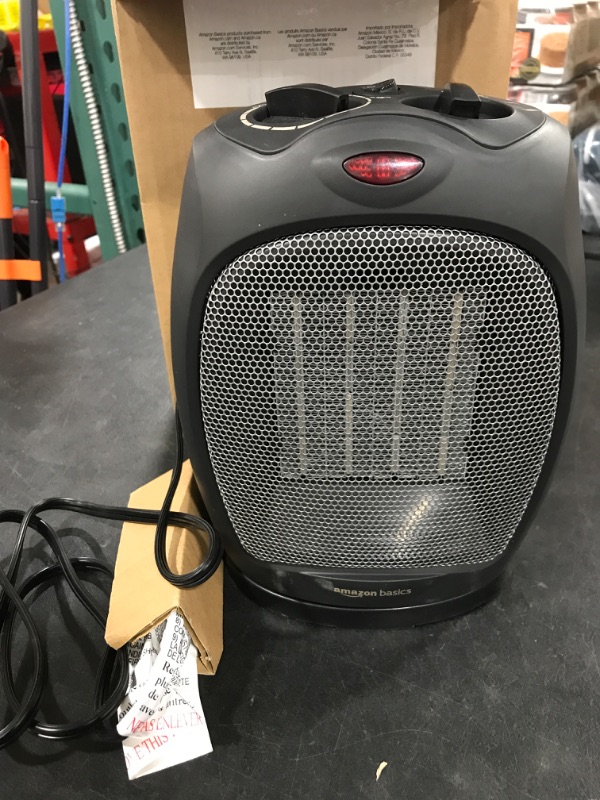 Photo 2 of Amazon Basics 1500W Oscillating Ceramic Indoor Space Heater with Adjustable Thermostat, Black, 7.52"D x 6.34"W x 9.45"H