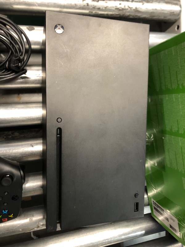 Photo 4 of ***HEAVILY USED - SEE COMMENTS***
Xbox Series X 1TB SSD Console - Includes Xbox Wireless Controller - Up to 120 frames per second - 16GB RAM 1TB SSD - Experience True 4K Gaming - Xbox Velocity Architecture