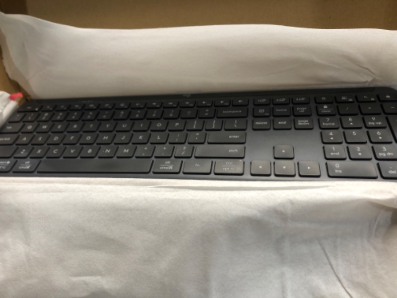 Photo 2 of ***(MINOR DAMAGE/ SEE NOTES) ***
Logitech MK955 Signature Slim Wireless Keyboard and Mouse Combo, for Larger Hands, Quiet Typing and Clicking, Switch Across Three Devices, Bluetooth, Multi-OS, for Windows and Mac - Graphite