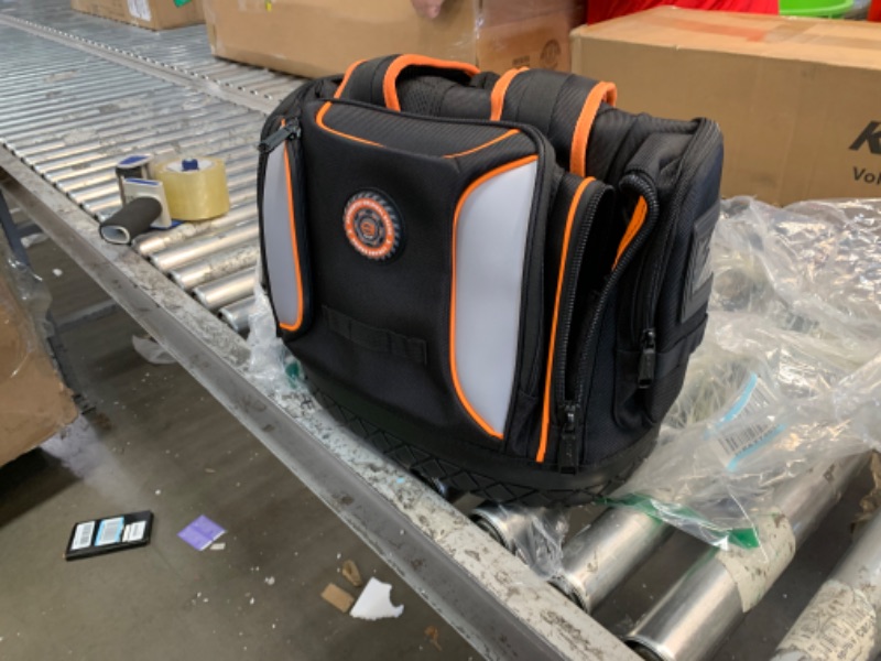 Photo 1 of Tool Bag Backpack, 75 Pockets & Loops Heavy Duty Tools Organizer Bags/HVAC Tool Carrier for Eelectrician/Construction Work with Molded Base and Combination Lock, Large, Black and Orange