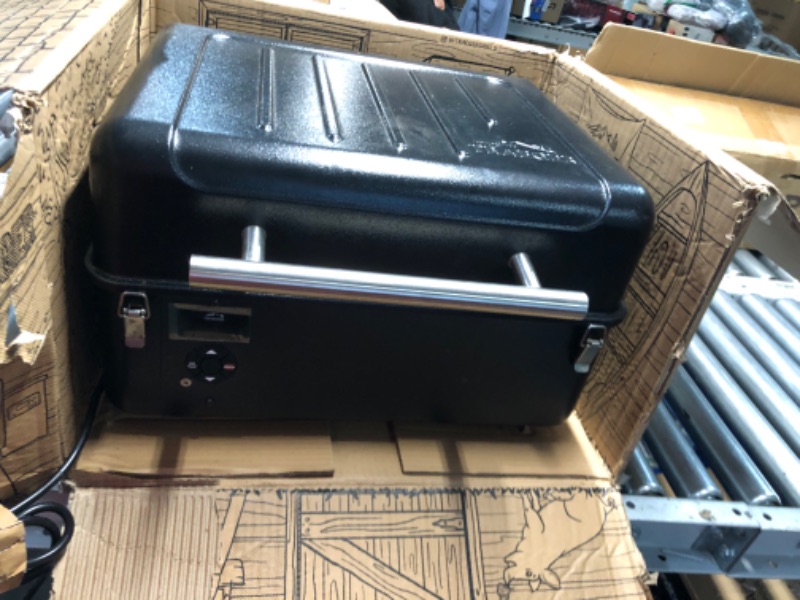 Photo 2 of ***HEAVILY USED AND DIRTY - LIKELY MISSING PARTS - UNABLE TO VERIFY FUNCTIONALITY***
Traeger Grills TFT18KLD Ranger, Portable Wood Pellet Grill and Smoker – Electric Tabletop Pellet Smoker with Digital Arc Controller, Cast Iron Griddle, For Tailgating and