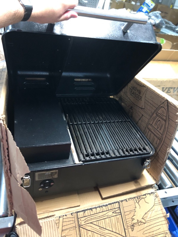 Photo 4 of ***HEAVILY USED AND DIRTY - LIKELY MISSING PARTS - UNABLE TO VERIFY FUNCTIONALITY***
Traeger Grills TFT18KLD Ranger, Portable Wood Pellet Grill and Smoker – Electric Tabletop Pellet Smoker with Digital Arc Controller, Cast Iron Griddle, For Tailgating and