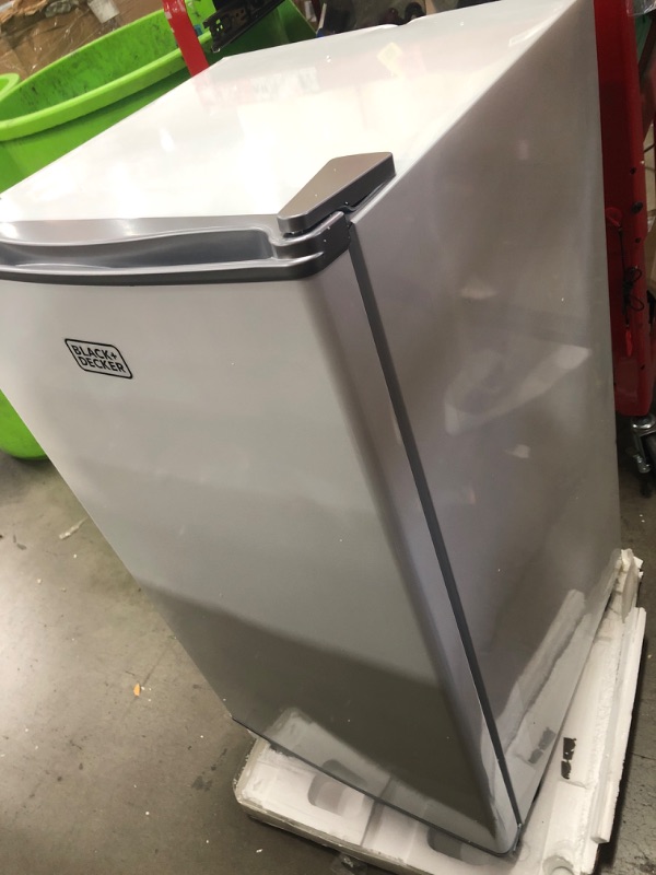 Photo 2 of **MINOR DAMAGE DENT IN BACKSIDE** 
BLACK+DECKER BCRK32W Compact Refrigerator Energy Star Single Door Mini Fridge with Freezer, 3.2 Cubic Ft., White