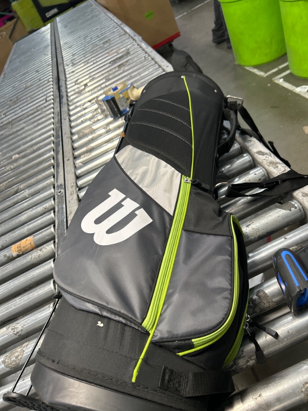 Photo 2 of ***MISSING A   CLUB ***K28 Wilson golf clubs with carrying bag. Green and grey set