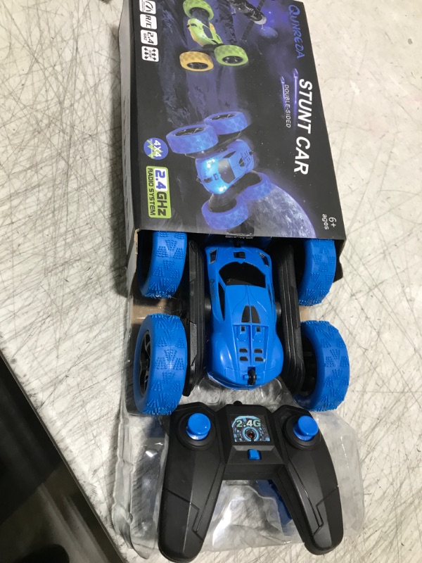 Photo 2 of QUNREDA Remote Control Car for Kids Ages 6+, RC Cars Stunt Car Toy 4WD Double Sided 360° Rotating Remote Control with Headlights, Birthday Xmas Gifts for Boys 6 7 8 9 10 11 12 1-Blue