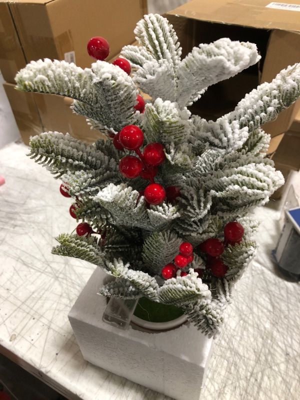 Photo 2 of Artificial Mini Christmas Tree Tabletop Xmas Decorations,14 Inch Small Cedar Tree with Red Berry Ornaments for Table Top Office Desk Classroom Room Party Holiday Christmas Decor (White Pot)