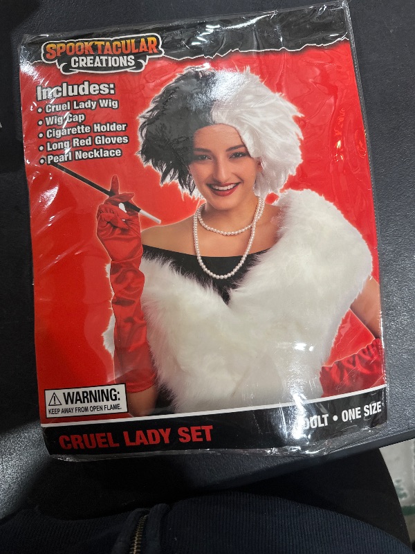 Photo 1 of Spooktacular Creations Women Cruel Lady Costume Wig Set, Halloween Costume Accessories, Black and White Wig, Cosplay Party Accessories with Gloves, Holder, Necklace and Short Bob Wavy Wig