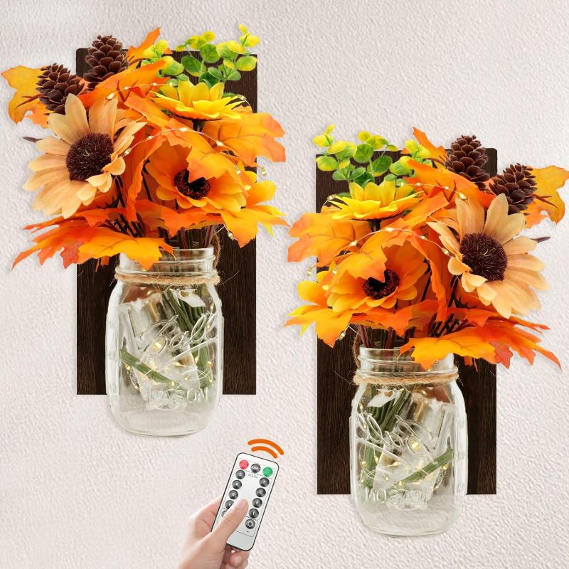 Photo 1 of 2 Pack Christmas Mason Jar Sconce Rustic Wall Sconces Decorative Mason Jar Wall Decor with Christmas Flower Remote Control LED Fairy Lights Farmhouse Christmas Home (Autumn Theme)
