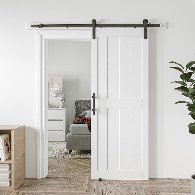 Photo 1 of 32in x 96in Sliding Barn Door with 6ft Barn Door Hardware Kit & Handle, Pre-Drilled Holes Easy Assembly -Solid Barn Door Slab Covered with Water-Proof PVC Surface, White
