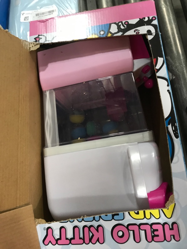 Photo 1 of Hello Kitty and Friends, 12” Claw Machine with 8 Collectible Mini Figures - Officially Licensed Sanrio Product from Jazwares (Amazon Exclusive)