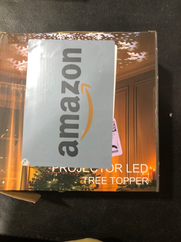 Photo 1 of PHITRIC Christmas Tree Topper, 8" Gold Lighted Star Christmas Tree Topper, Hollow Star Craft Christmas Tree Star with White Snowflake Projector Lights, Xmas Tree Topper for Christmas Tree Decorations