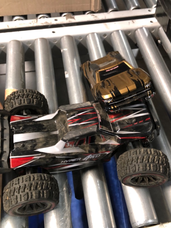 Photo 2 of **MAJOR DAMAGE HEAVILY USED BUT STILL SEEMS FUNCTIONAL**
HYPER GO H14BM 1/14 Brushless RC Cars for Adults Fast 50 mph, RC Trucks 4wd Offroad Waterproof, Electric Powered High Speed RC Car, Scary Fast Extreme RC Truggy with 3S Battery for Snow Sand