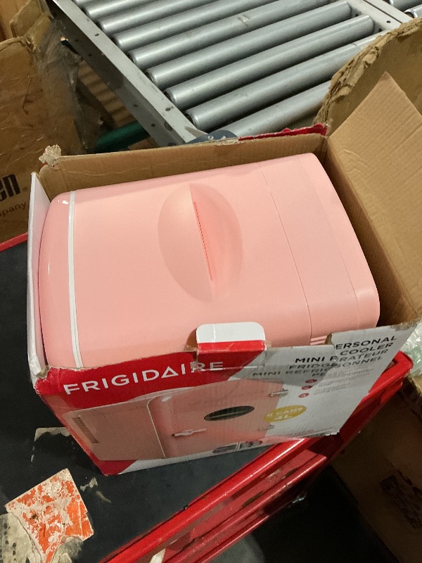 Photo 1 of ***MISSING PARTS***
Frigidaire EFMIS171 Retro Mini Portable Personal Fridge - Ideal for Home, Office or Dorm - Includes Carrying Handle, AC/DC Wall/Car Charger (Pink)