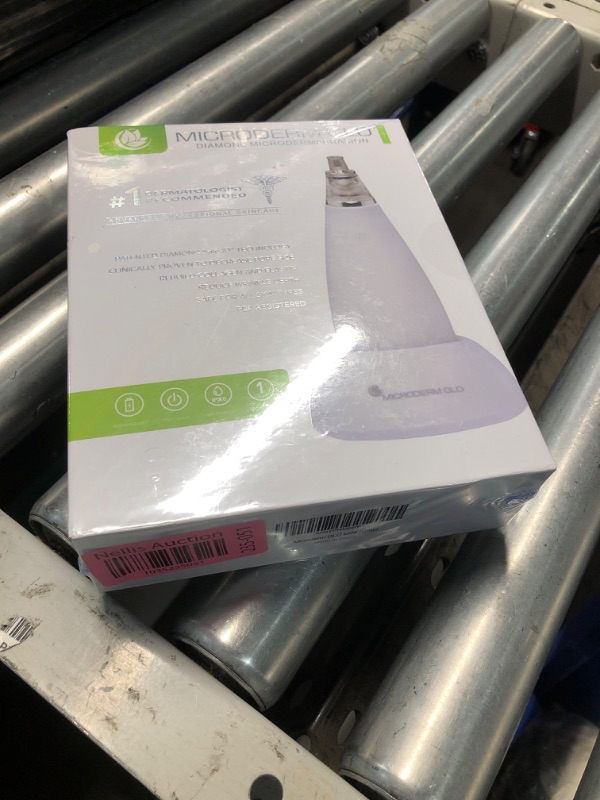 Photo 2 of ***FACTORY SEALED***Microderm Glo Mini Diamond Microdermabrasion and Suction Tool - Best Pore Vacuum