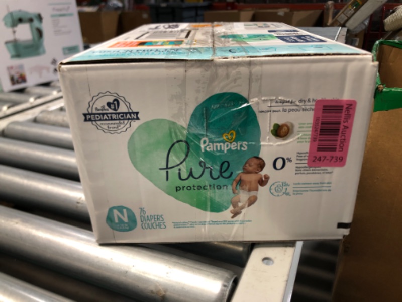 Photo 2 of ***1 PACK OPEN/PARTIALLY USED***Pampers Pure Protection Diapers Newborn - Size 0, 76 Count, Hypoallergenic Premium Disposable Baby Diapers Newborn 76