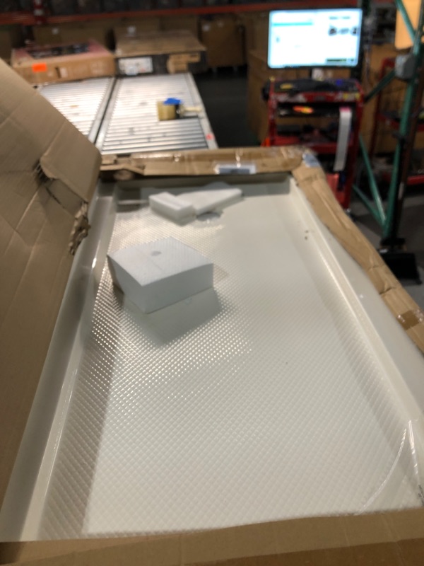 Photo 2 of ***HAS FACTORY FILM ON ITEM*** DreamLine SlimLine 30 in. D x 60 in. W x 2 3/4 in. H Right Drain Single Threshold Shower Base in Biscuit, DLT-1130602-22