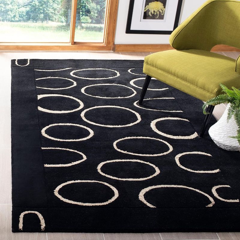 Photo 1 of *STOCK PHOTO JUST FOR REFERENCE** SAFAVIEH Soho Collection 7'6" x 9'6" Black/Ivory SOH714A Handmade Premium Wool & Viscose Area Rug
