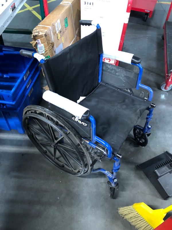 Photo 7 of ***HEAVILY USED AND DIRTY - MISSING A FOOTREST - SEE PICTURES - NO PACKAGING***
Blue Streak Wheelchair with Flip Back Desk Arms, Elevating Leg Rests 20" Seat