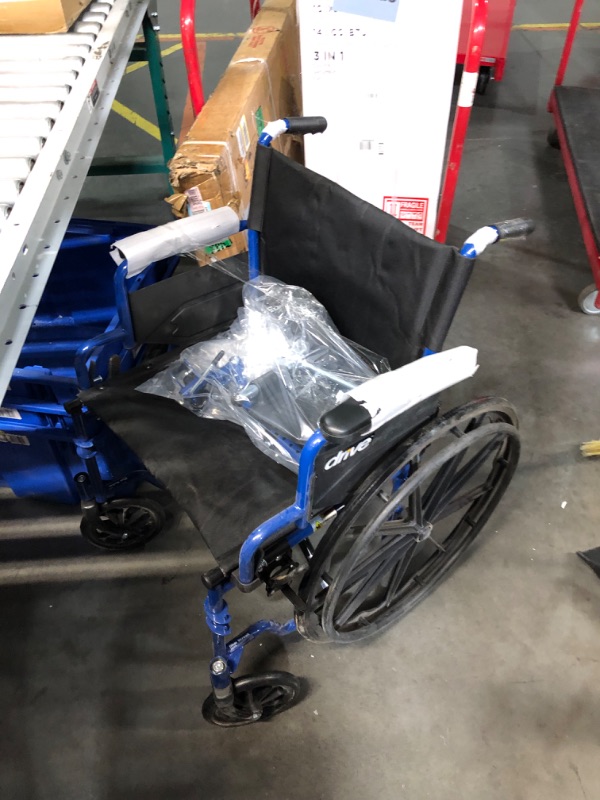 Photo 2 of ***HEAVILY USED AND DIRTY - MISSING A FOOTREST - SEE PICTURES - NO PACKAGING***
Blue Streak Wheelchair with Flip Back Desk Arms, Elevating Leg Rests 20" Seat