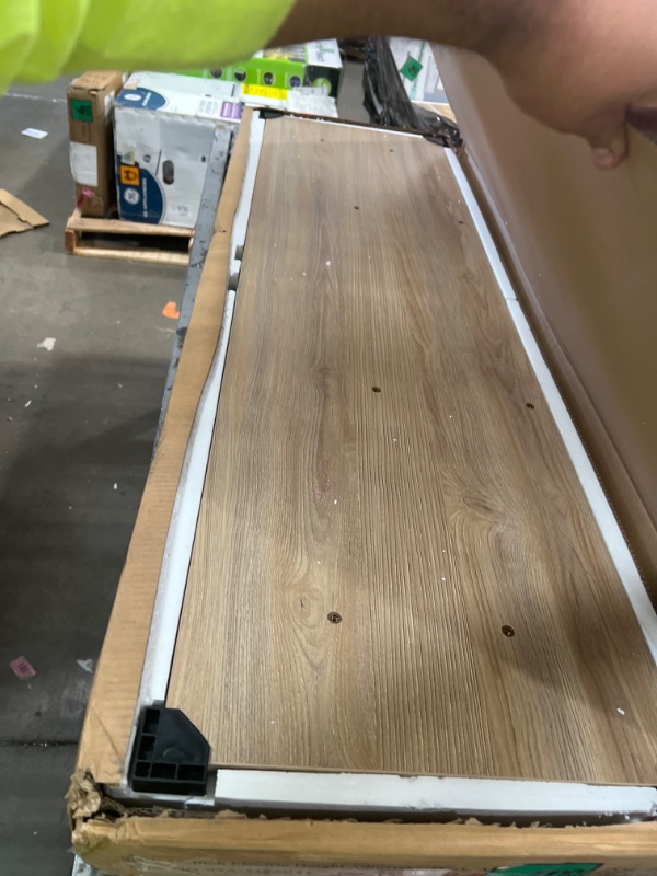 Photo 1 of SHW 55-Inch Large Electric Height Adjustable Standing Desk, 55 x 28 Inches, Maple Maple 55-Inch