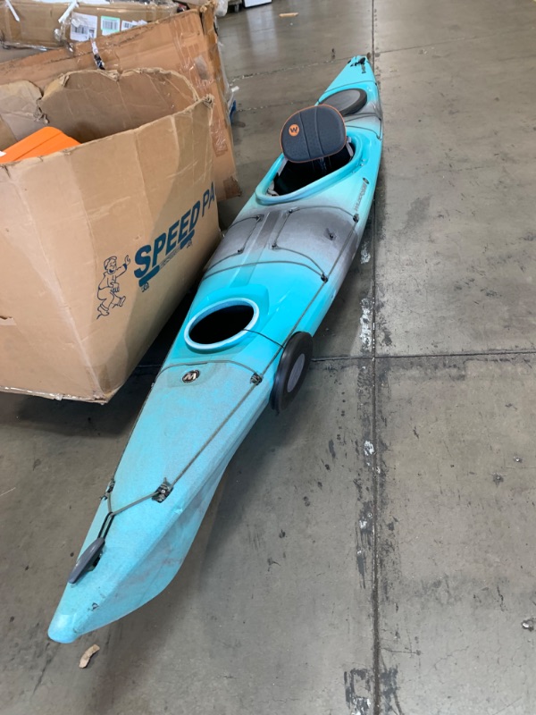 Photo 4 of (used/minor) Wilderness Systems Tsunami 145 | Sit Inside Touring Kayak | Kayak with Rudder | 14' 6" | Breeze Blue