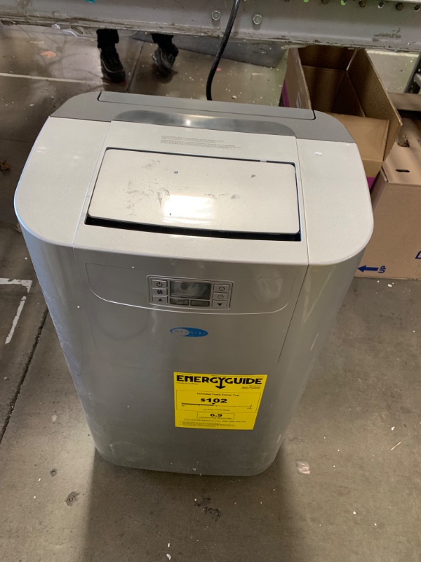 Photo 2 of ***USED - DAMAGED - SEE COMMENTS***
7,000 BTU Portable Air Conditioner Cools 400 Sq. Ft. with Heater, Dehumidifier, Remote, Filter in Silver