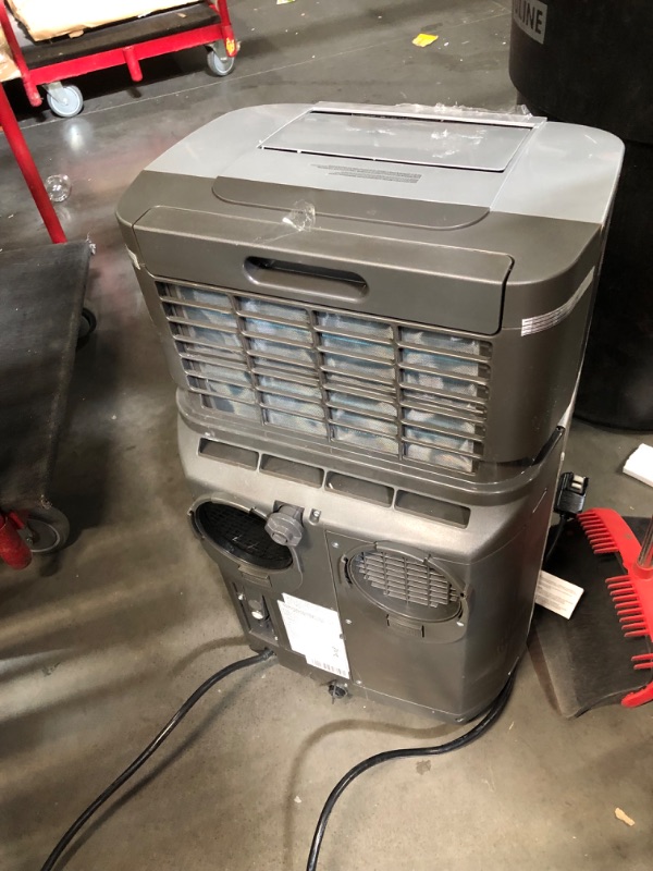 Photo 9 of ***USED - DAMAGED - SEE COMMENTS***
7,000 BTU Portable Air Conditioner Cools 400 Sq. Ft. with Heater, Dehumidifier, Remote, Filter in Silver