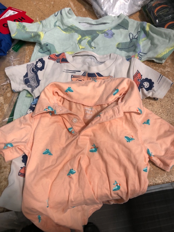 Photo 1 of  Boys 3 pack carters shirts sizes vary 5t -2t