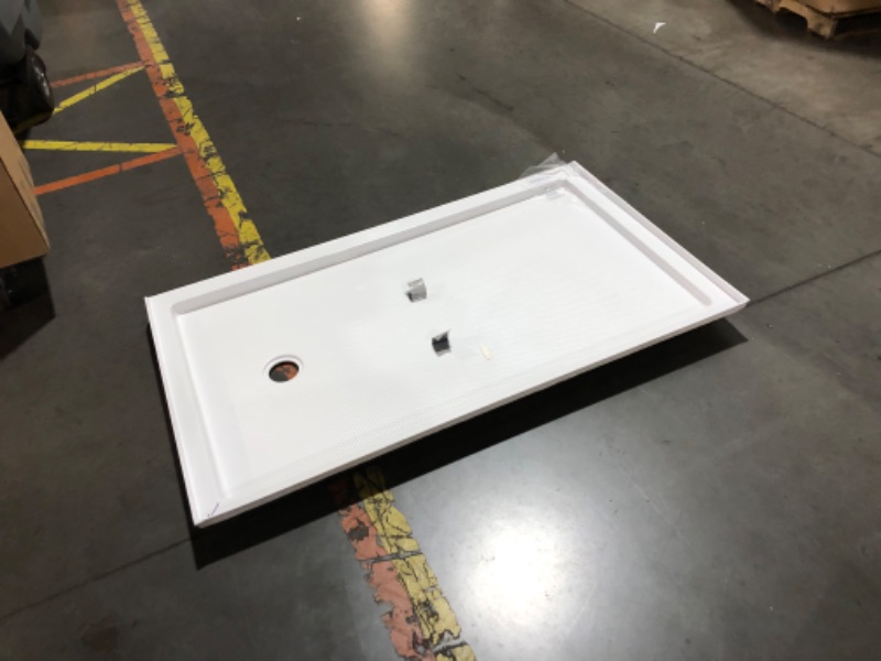 Photo 6 of ***USED - DAMAGED - SEE PICTURES - UNABLE TO VERIFY FUNCTIONALITY***
DreamLine SlimLine 60 in. x 36 in. Single Threshold Shower Pan Base in White with Right Hand Drain