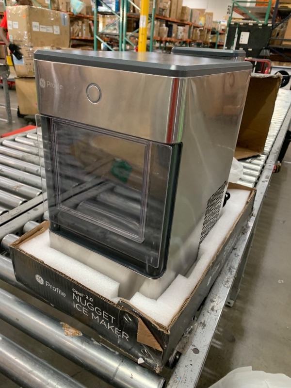 Photo 4 of ***DAMAGED - DENTED - POWERS ON - UNABLE TO TEST FURTHER***
GE Profile Opal 2.0 with 0.75 Gallon Tank, Chewable Crunchable Countertop Nugget Ice Maker, Scoop included, 38 lbs in 24 hours, Pellet Ice Machine with WiFi & Smart Connected, Stainless Steel Opa