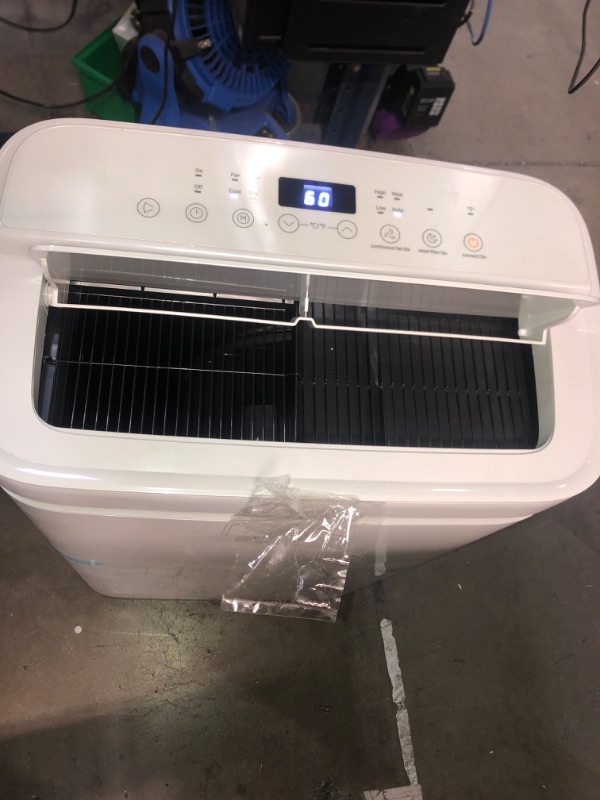 Photo 2 of *powers on*Midea 14,000 BTU ASHRAE (10,000 BTU SACC) Portable Air Conditioner, Cools up to 375 Sq. Ft., with Dehumidifier & Fan mode, Control with Remote, Amazon Alexa & Google Assistant, Easy-to-use and Install
