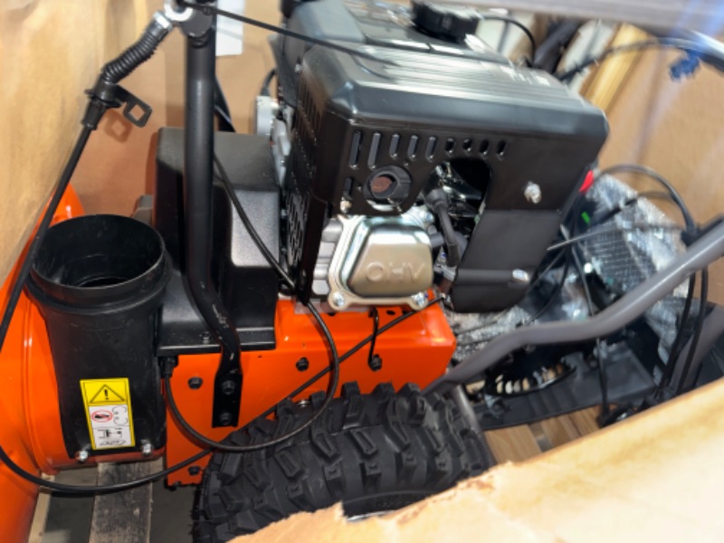 Photo 4 of *UNABLE TO TEST**Husqvarna ST224 Snow Blower, 212-cc 5.9-HP, 24-Inch Snow Thrower, Friction Disc Transmission, Two Stage with Push Button Electric Start and Power Steering, Orange